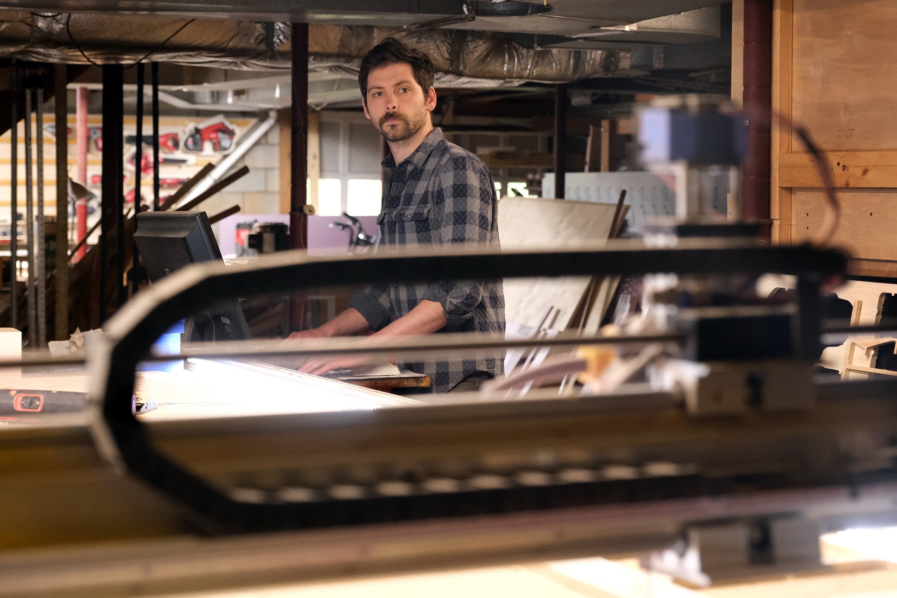 Matthew Steele is using his ASC fellowship to add capacity to use a variety of materials and tools for commissions. This is the CNC router in his home studio. Photo by Nancy Pierce.