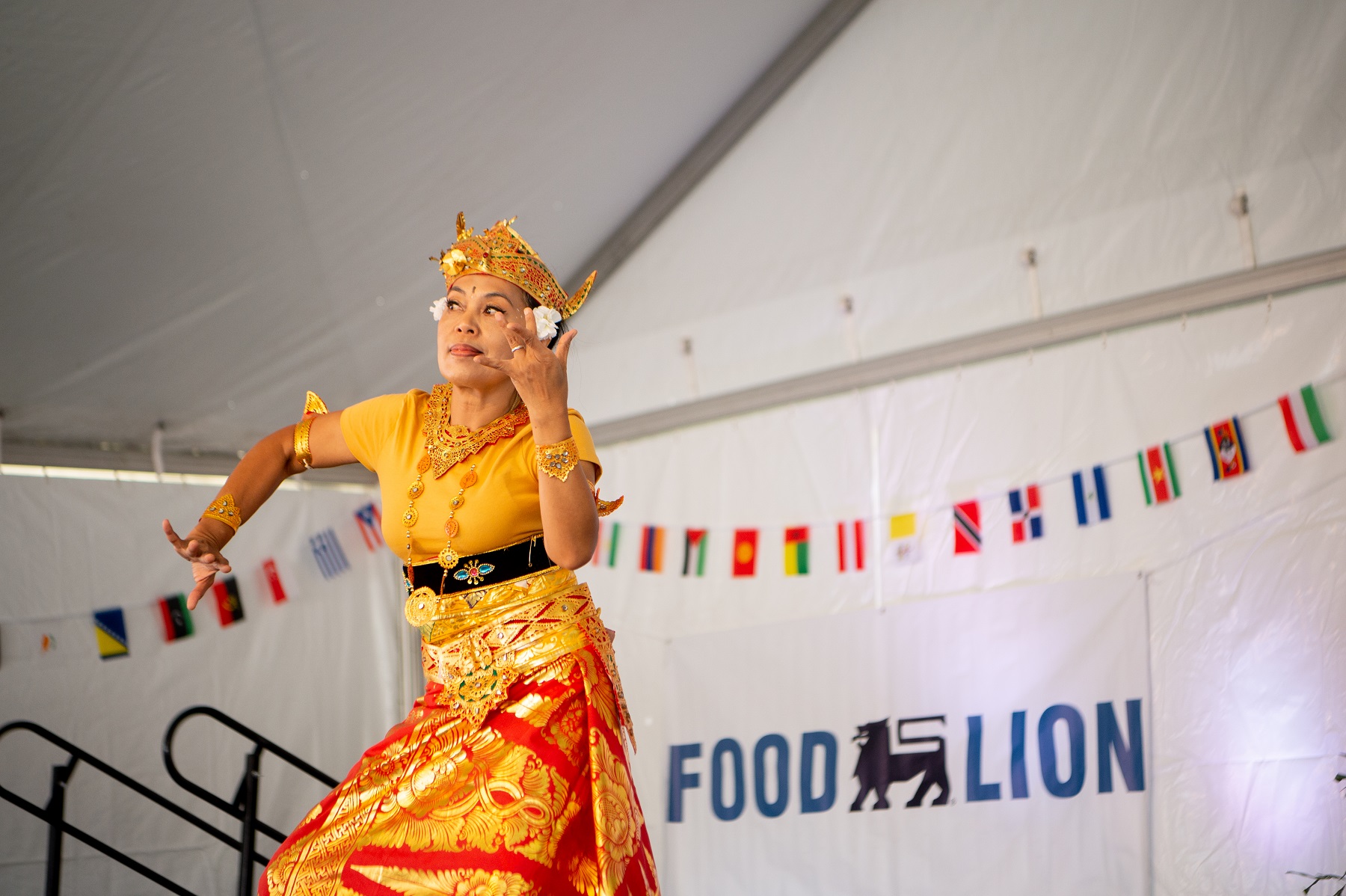 A dancer performing at the 2022 Charlotte Dragon Boat and Asian Festivals in Lake Norman. 