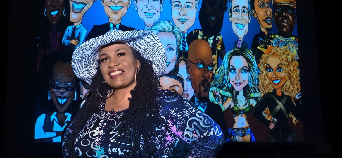 2023 Creative Renewal Fellowship recipient Lena Jackson. Projected on a screen behind her is a collage of caricatures she has done of famous people. Photo by Nancy Pierce.