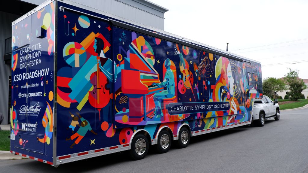 The Charlotte Symphony Orchestra's “CSO Roadshow,” with artwork designed by Rosalia Torres-Weiner, serves as a stage for community concerts held throughout the city and county. 
